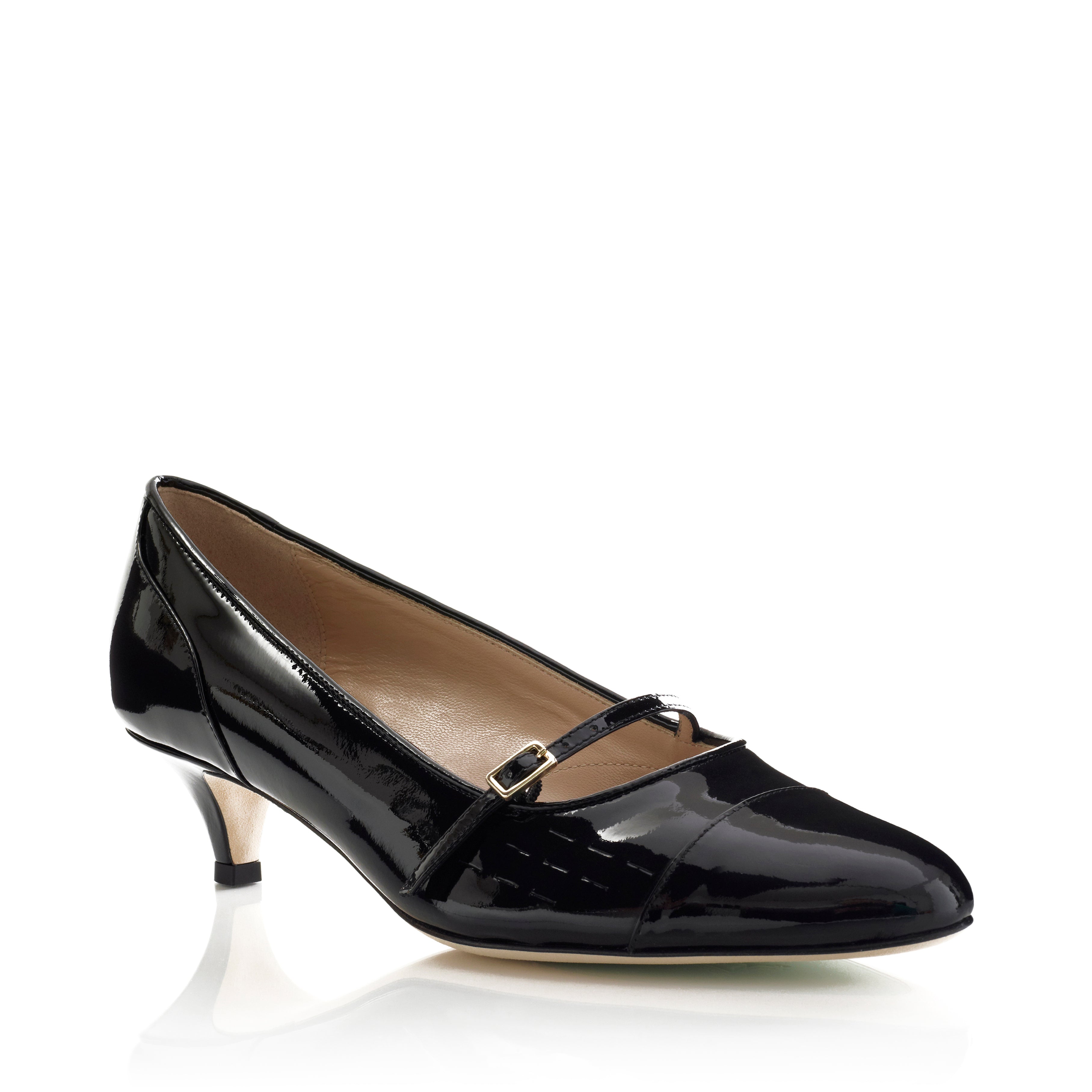 A single black patent leather Mary Jane pump with a kitten heel and a small gold buckle, shown on a white background with a soft reflection.
